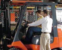 People Operating a Forklift