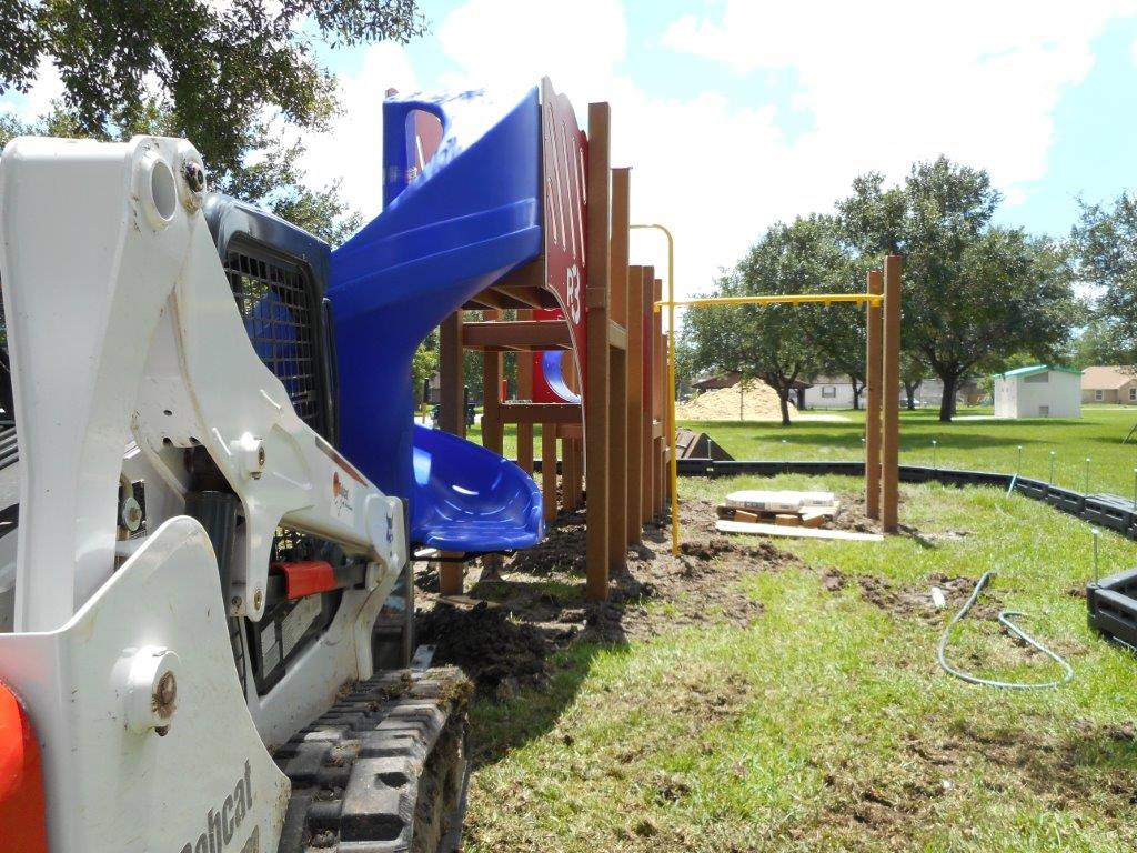Skid loader on Amistad Park construction site