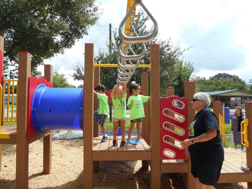 Kids on the monkey bars and play equipment